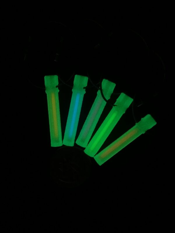 3D printed glow-in-the-dark (GITD) fobs when exposed to UV light